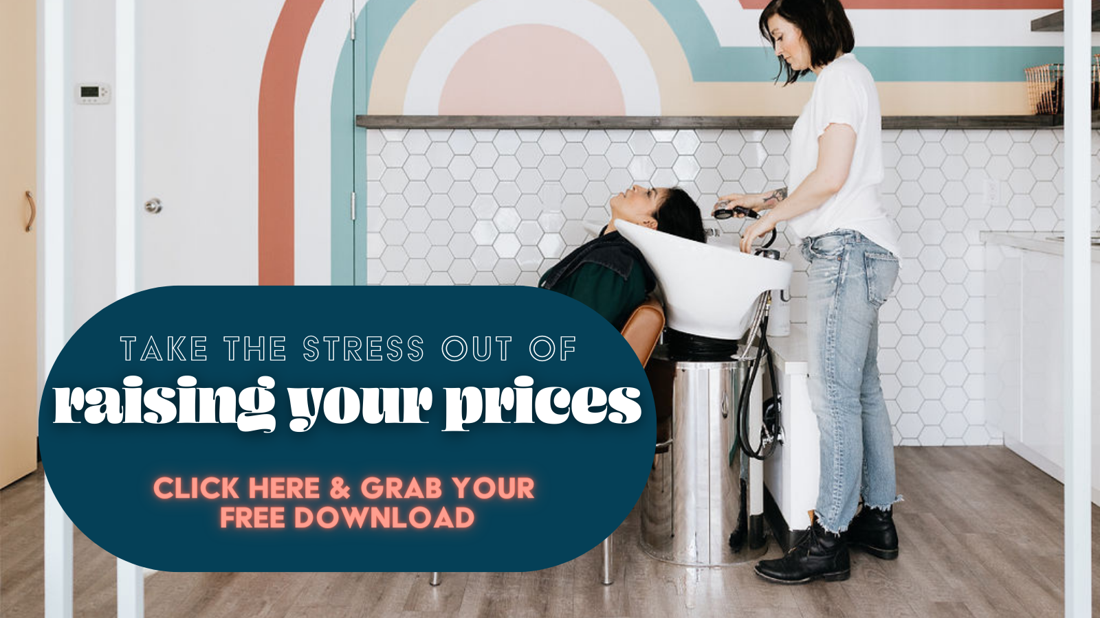 Dawn stands at a salon sink wearing blue jeans and a ripped t-shirt as she washes her clients hair who is leaning back in the sink. Text overlay reads "Take the stress out of raising your prices click here and grab your free download"